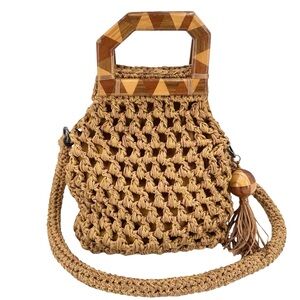 Catarina Mina crocheted top-handle bag  carved wooden handle and tassel.